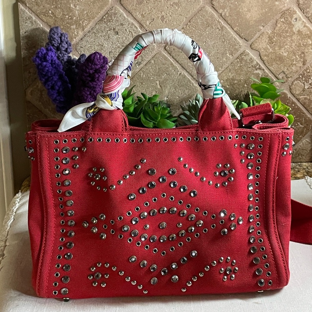 Prada Studded Tote red canvas hand or shoulder bag. COA, with auth. Card